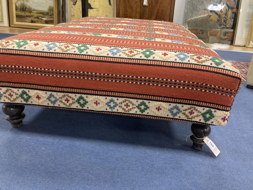 A large Victorian Kelim covered stool, length 122cm, depth 85cm, height 32cm